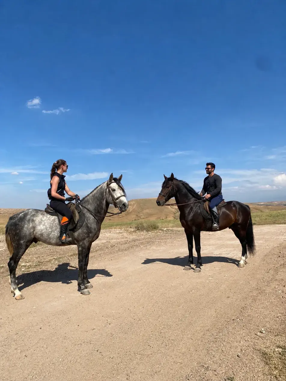 Through the stone desert, on horseback.